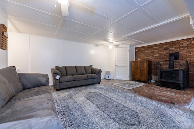 82 Uzzi Ave, Westerly, RI 02891 - living area with a wood stove and a ceiling fan