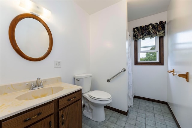 82 Uzzi Ave, Westerly, RI 02891 - full bath with tile patterned floors, toilet, baseboards, and vanity