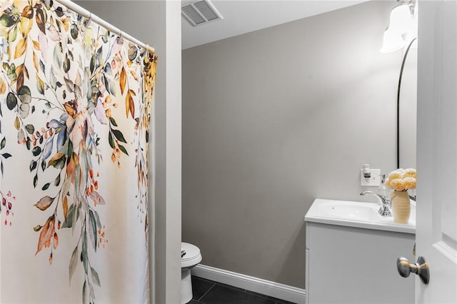 40 Saw Mill Dr Unit 203, North Kingstown, RI 02852 - bathroom featuring tile patterned floors, toilet, vanity, a shower with shower curtain, and baseboards