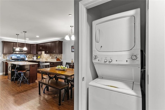 40 Saw Mill Dr Unit 203, North Kingstown, RI 02852 - washroom with estacked washer and dryer, wood finished floors, and recessed lighting