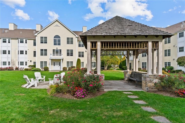 40 Saw Mill Dr Unit 203, North Kingstown, RI 02852 - view of property's community featuring a gazebo, a patio, and a lawn