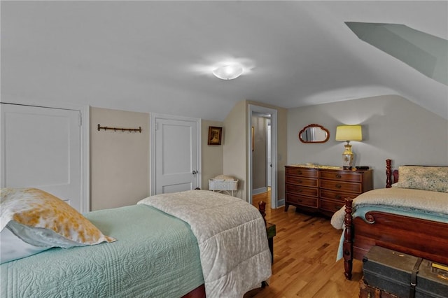 bedroom featuring light wood-style flooring