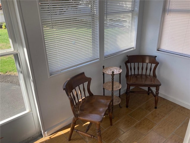 30 Charles St, Cranston, RI 02920 - living area featuring baseboards