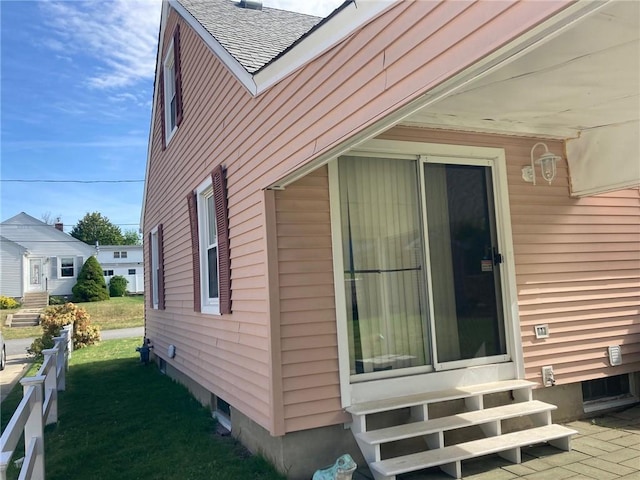 30 Charles St, Cranston, RI 02920 - view of side of home featuring entry steps and roof with shingles