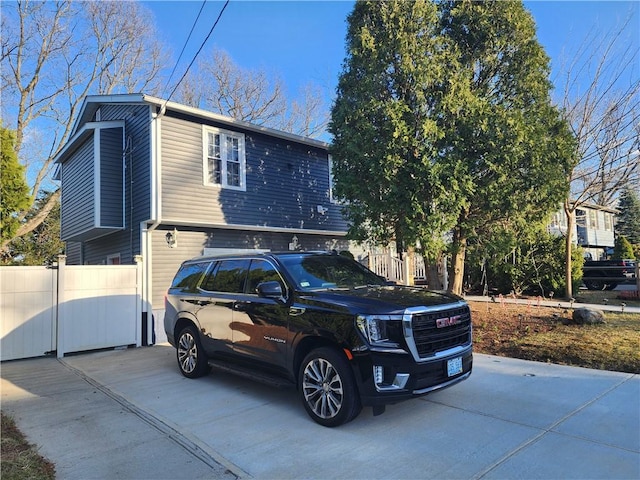 8 Marigold Ct, Cranston, RI 02920 - view of front facade with fence