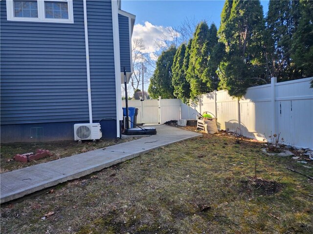 8 Marigold Ct, Cranston, RI 02920 - fenced backyard with ac unit and a gate