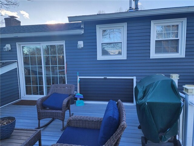 8 Marigold Ct, Cranston, RI 02920 - wooden deck with a grill