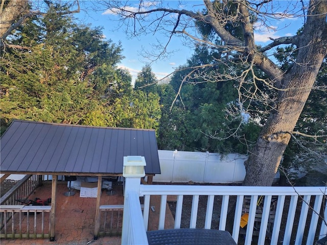 8 Marigold Ct, Cranston, RI 02920 - view of home's exterior with a fenced backyard, metal roof, and a standing seam roof