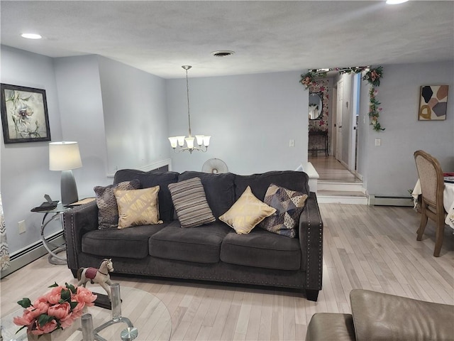 8 Marigold Ct, Cranston, RI 02920 - living area featuring baseboard heating, a chandelier, light wood-style floors, and recessed lighting