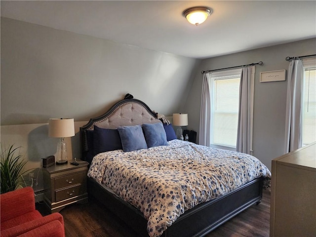 64 Westwood Ave, Cranston, RI 02905 - bedroom with multiple windows and dark wood-style flooring