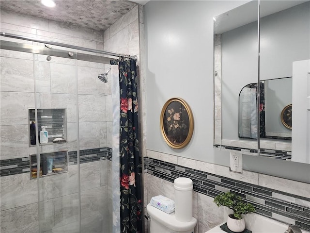 64 Westwood Ave, Cranston, RI 02905 - bathroom featuring a shower stall, toilet, tile walls, and wainscoting
