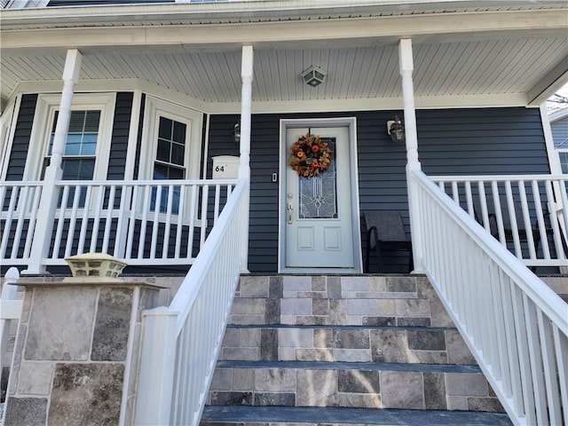 64 Westwood Ave, Cranston, RI 02905 - view of exterior entry featuring a porch