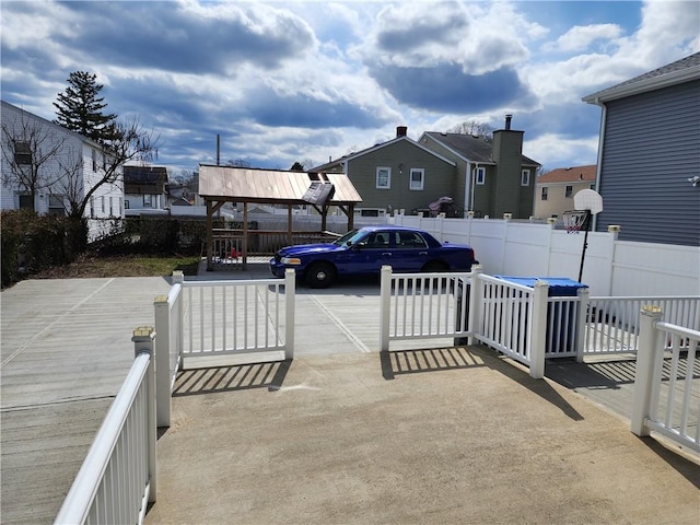 64 Westwood Ave, Cranston, RI 02905 - view of patio featuring fence and a residential view