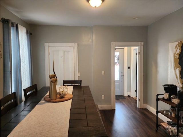 64 Westwood Ave, Cranston, RI 02905 - foyer entrance featuring dark wood-style floors and baseboards