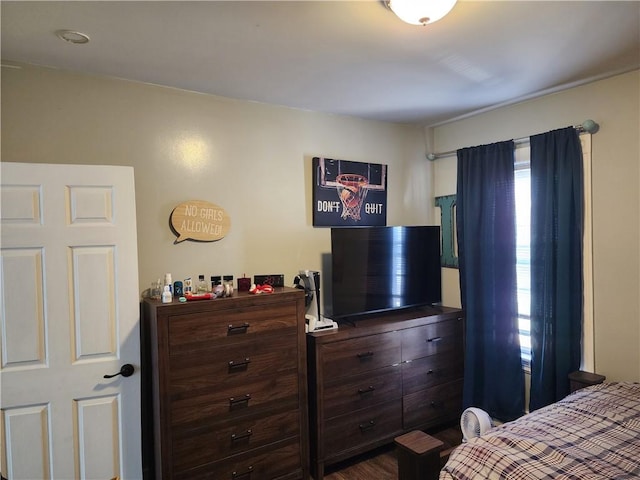 64 Westwood Ave, Cranston, RI 02905 - bedroom featuring multiple windows and dark wood-style flooring