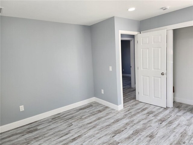 68 Westwood Ave, Cranston, RI 02905 - unfurnished bedroom featuring light wood-type flooring, baseboards, recessed lighting, and a closet