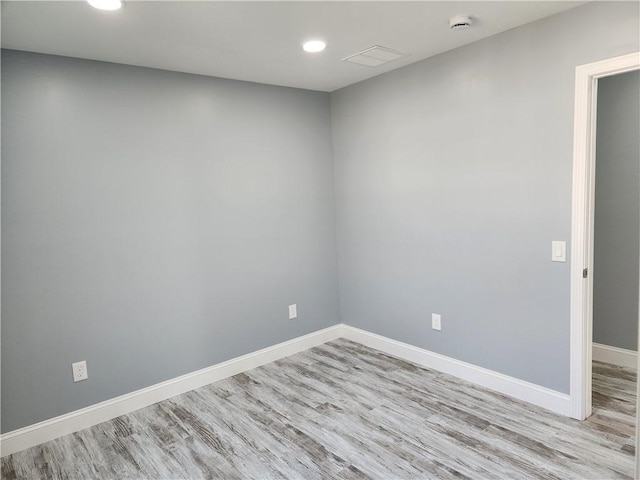 68 Westwood Ave, Cranston, RI 02905 - unfurnished room with light wood finished floors, baseboards, recessed lighting, and a smoke detector
