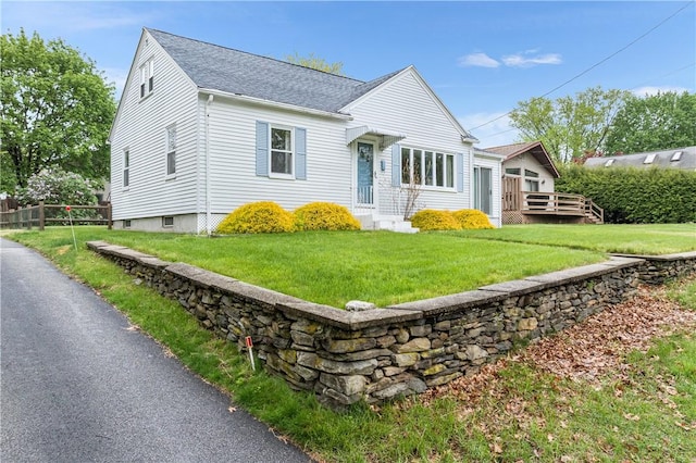 11 Homestead St, Smithfield, RI 02917 - view of front of property featuring roof with shingles and a deck