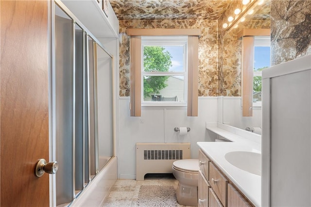 11 Homestead St, Smithfield, RI 02917 - bathroom featuring radiator, healthy amount of natural light, vanity, and toilet