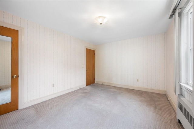 11 Homestead St, Smithfield, RI 02917 - carpeted spare room with radiator
