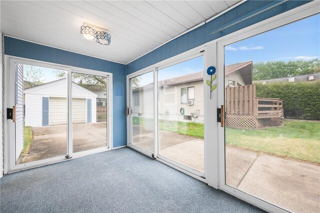 11 Homestead St, Smithfield, RI 02917 - doorway to outside featuring carpet