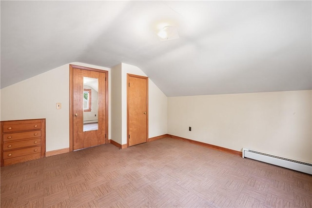 11 Homestead St, Smithfield, RI 02917 - bonus room featuring baseboards, baseboard heating, and lofted ceiling