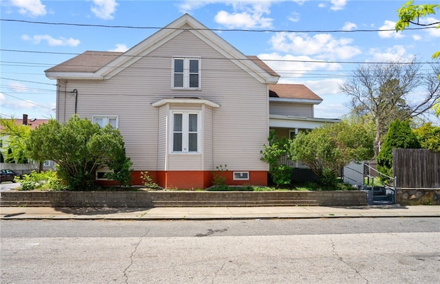 view of property exterior with fence