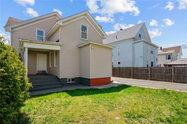 back of property featuring a patio area