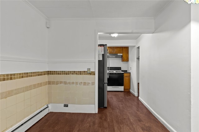 clothes washing area with baseboard heating, dark wood-style floors, and ornamental molding