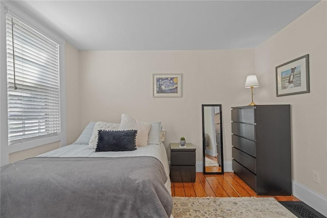 275 Hope St, Bristol, RI 02809 - bedroom featuring wood-type flooring and baseboards