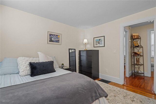 275 Hope St, Bristol, RI 02809 - bedroom featuring wood finished floors and baseboards