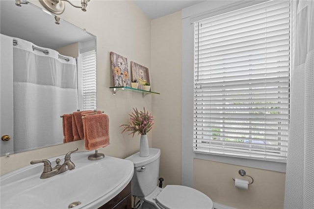 275 Hope St, Bristol, RI 02809 - full bathroom with toilet, vanity, and curtained shower