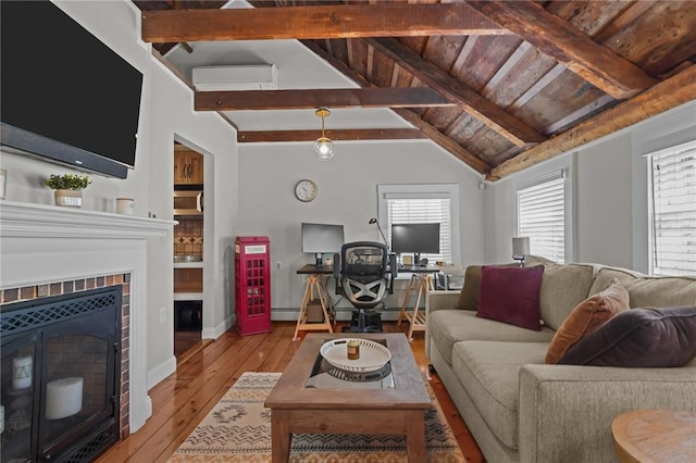275 Hope St, Bristol, RI 02809 - living room with wood-type flooring, a tiled fireplace, and wood ceiling