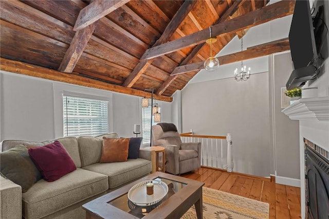 275 Hope St, Bristol, RI 02809 - living room with wooden ceiling, hardwood / wood-style floors, a chandelier, baseboards, and a fireplace