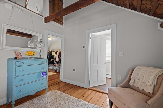 275 Hope St, Bristol, RI 02809 - living area featuring hardwood / wood-style flooring, baseboard heating, and baseboards