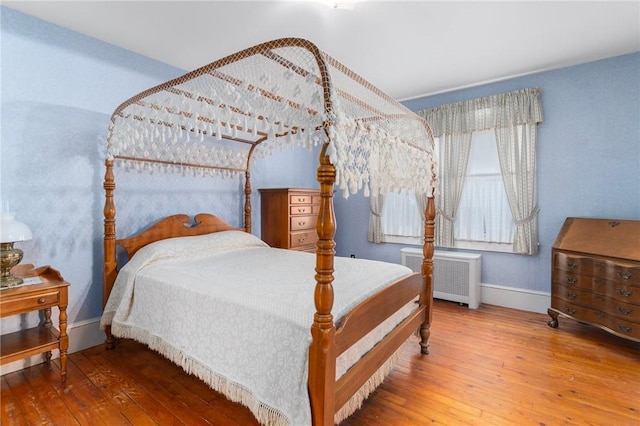 35 Miles Ave, East Providence, RI 02914 - bedroom featuring radiator heating unit, hardwood / wood-style floors, and baseboards