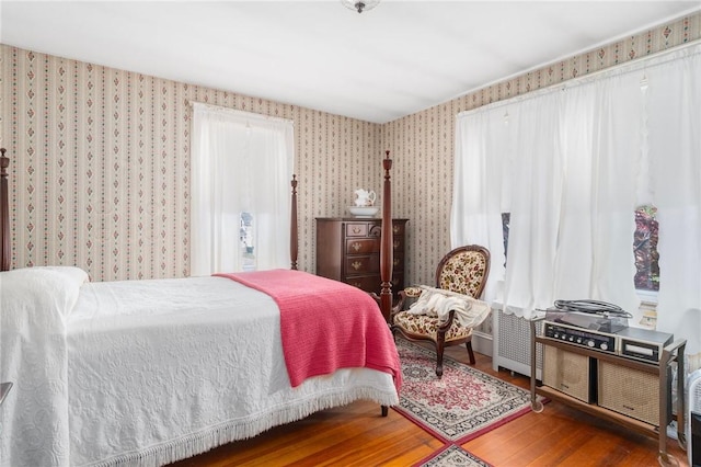 35 Miles Ave, East Providence, RI 02914 - bedroom featuring wallpapered walls, multiple windows, and wood finished floors