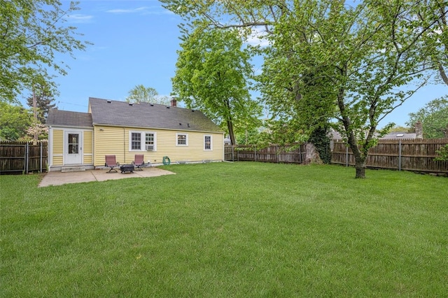 rear view of property with a patio area