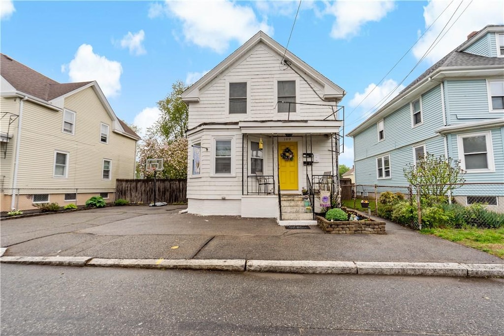 100 Sutton Ave, East Providence, RI 02914 - view of front of house featuring fence