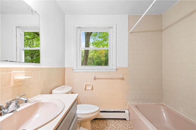 3 Baylor Dr, Coventry, RI 02816 - full bathroom with a baseboard heating unit, tile walls, toilet, vanity, and  shower combination