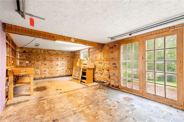 3 Baylor Dr, Coventry, RI 02816 - spare room with a textured ceiling and wooden walls
