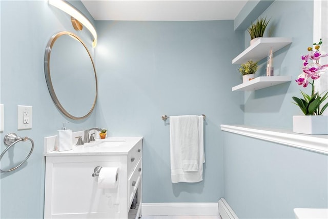 bathroom featuring vanity and baseboards