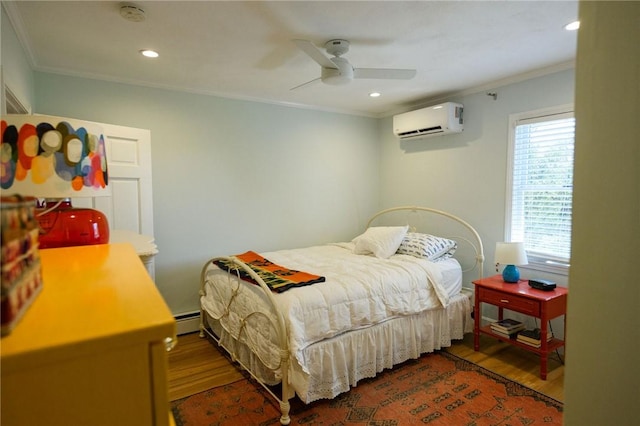bedroom featuring an AC wall unit, crown molding, wood finished floors, a baseboard heating unit, and ceiling fan