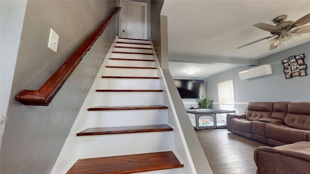 11 Crane St S, Pawtucket, RI 02860 - stairs featuring an AC wall unit, a ceiling fan, wood finished floors, and baseboards