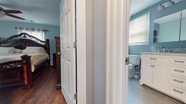 11 Crane St S, Pawtucket, RI 02860 - bedroom featuring multiple windows, a sink, and light wood finished floors