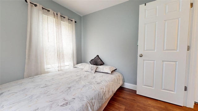 11 Crane St S, Pawtucket, RI 02860 - bedroom with multiple windows, wood finished floors, and baseboards