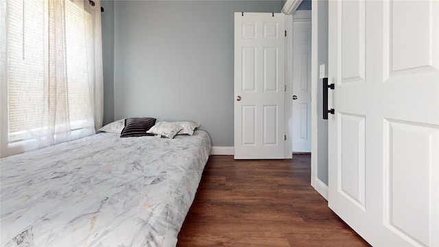 11 Crane St S, Pawtucket, RI 02860 - bedroom featuring multiple windows, dark wood-style floors, and baseboards