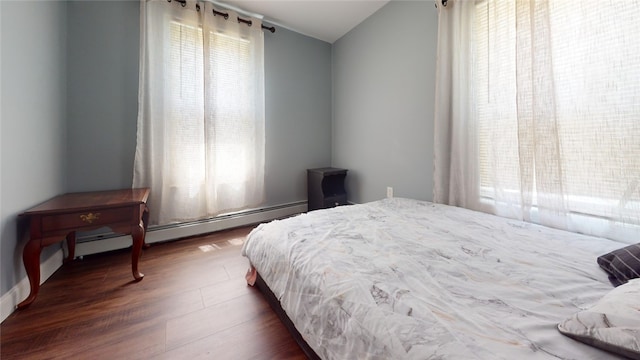 11 Crane St S, Pawtucket, RI 02860 - bedroom with a baseboard heating unit and dark wood finished floors