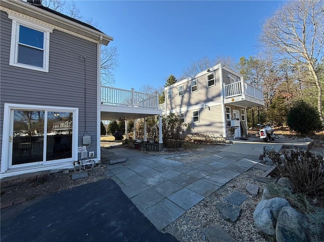view of patio / terrace with a balcony