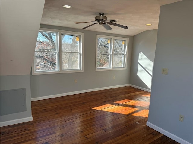 unfurnished room featuring wood-type flooring, baseboards, a ceiling fan, and recessed lighting